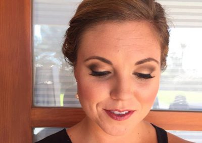 Medium brown smokey eye with a soft berry lip and rosy cheeks